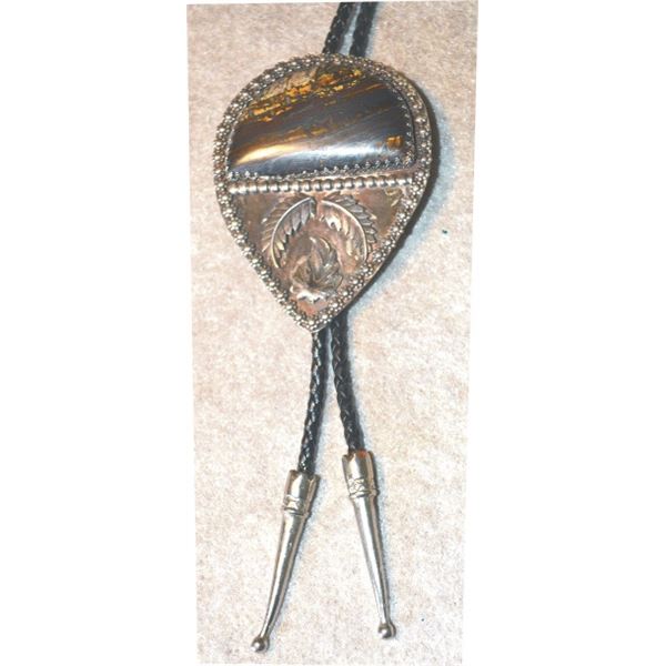 Navajo silver bolo tie with brown stone