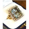 Image 1 : STEPHEN & YVONNE MILLER: 12.5 Carat Aquamarine and Diamond Cocktail Ring in 14K Yellow Gold