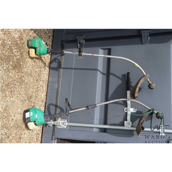 2 Weedeater FeatherLite 2 stroke string trimmers, untested at time of catalouging