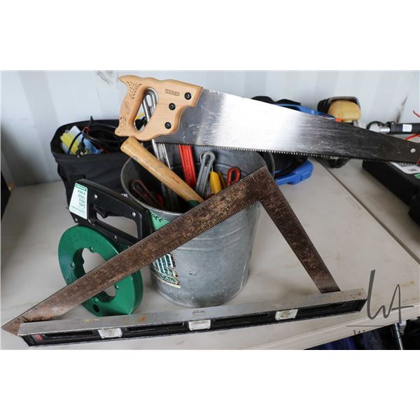 Pail of hand tools including Stanley hand saw, steel fish tape, assortment of adjustable wrenches, 2
