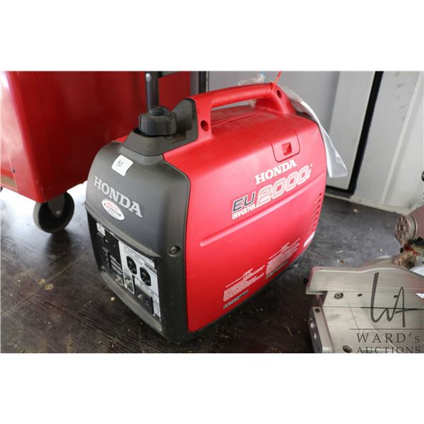 Honda EU2000i Inverter generator, appears new condition, includes original manual, not working at ti