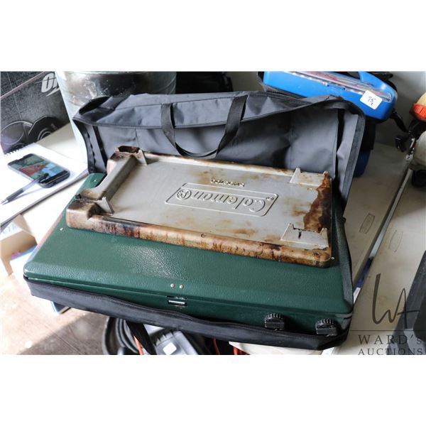 Coleman propane canister stove with griddle attachment in carrying case