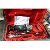 Image 1 : Milwaukee 6519-30 Sawzall corded reciprocating saw with extra blades and fitted hard case, working a