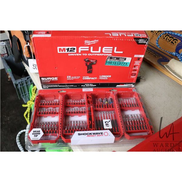 New in box Milwaukee M12 Fuel cordless impact with battery and charger, and new in packaging screwdr