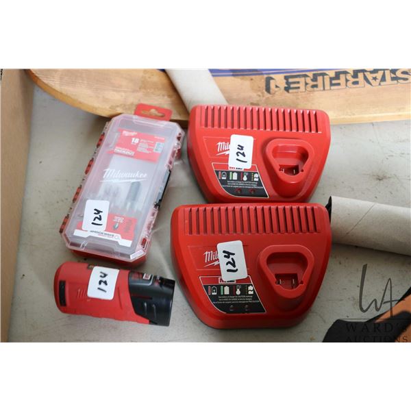 Milwaukee M12 Heated Gear power pack with battery, 2 chargers, and a set of bits