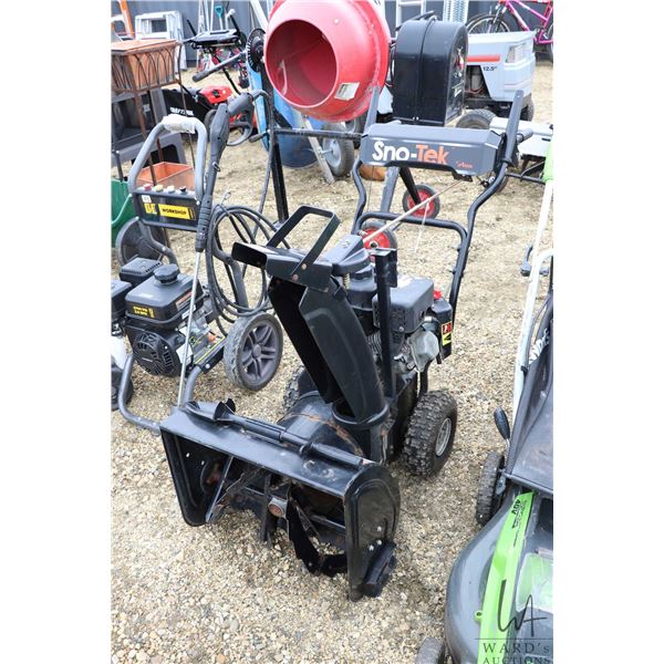 Ariens Sno-Trek 20" gas powdered snow thrower with electric start, running at time of catalouging
