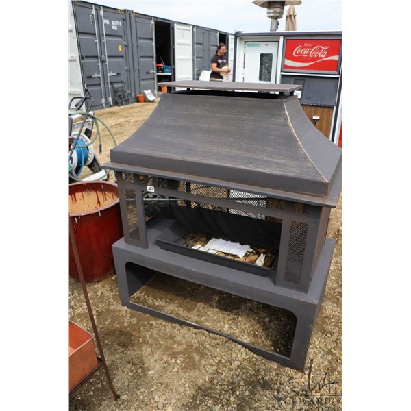 Metal encased outdoor wood fireplace, 46" high, 40" wide, 22" deep