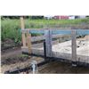 Image 4 : Tilt deck trailer with 7'x10' bed with 24" wooden stake sides, 13" tires, no serial number present