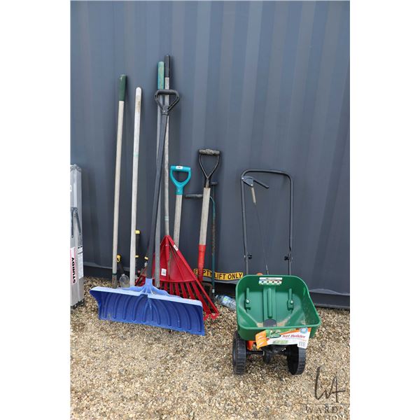 Selection of lawn care tools including a Scotts Turfbuilder fertilizer/seed spreader, garden fork, s