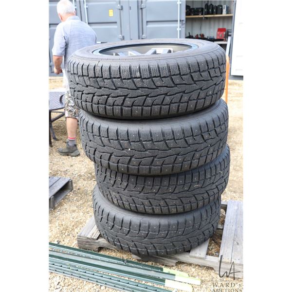Set of 4 Black Hawk Iceprey HW06 studded snow tires, 275/60R20, mounted on multifit gunmetal aluminu