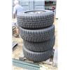 Image 1 : Set of 4 Black Hawk Iceprey HW06 studded snow tires, 275/60R20, mounted on multifit gunmetal aluminu