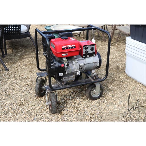 Honda EZ5000 gas powered generator on pneumatic tires, working at time of catalouging
