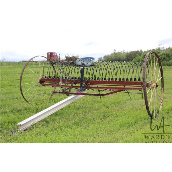 Antique Dump Rake, originally horse drawn and converted to be pulled by lot 205