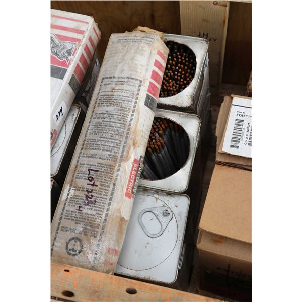 3 full and 1 partial container of welding rods
