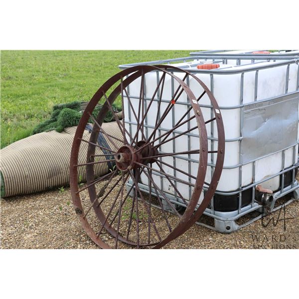 2 Antique metal spoked implement wheels, 50" diameter
