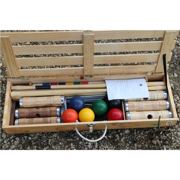 Wood cased family croquet set, appears unused and complete