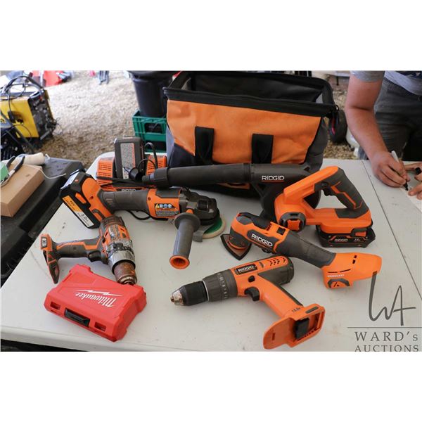 Selection of Rigid 18v battery operated tools including blower, 4" angle grinder, precision sander, 