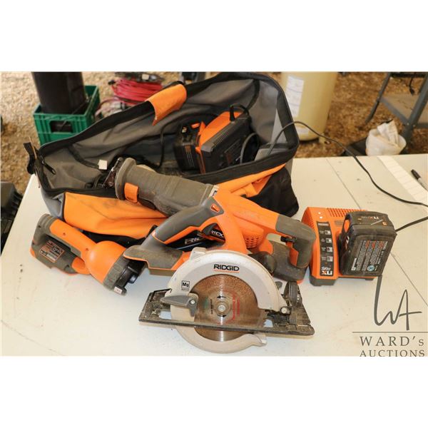 Selection of Rigid 24v battery operated tools including reciprocating saw, circular saw, flashlight,