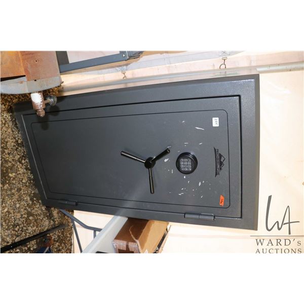 Large ridgeline insulated heavy duty gun safe with adjustable interior, measures 58" tall x 29" wide