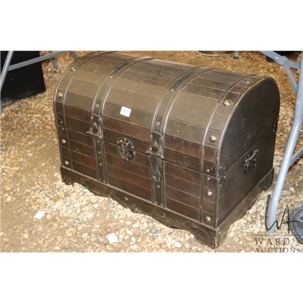 Wooden storage chest with Black and Decker corded leaf blower and extension cords