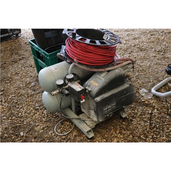 Hitachi 135psi air compressor with hose and extension cord, working at time of catalouging
