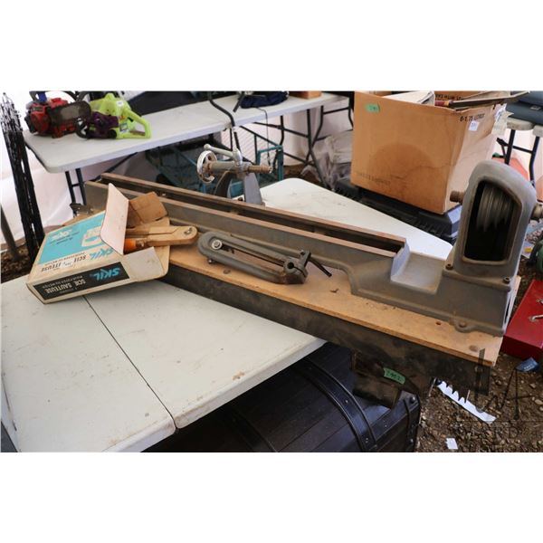 Rockwell 36" wood lathe with tail stop, tool rest, spare pulleys and accessories, assorted lathe chi