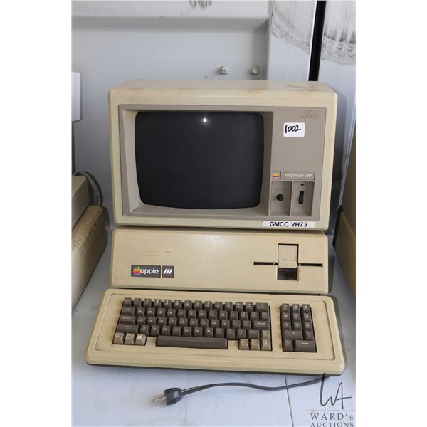 Vintage 1980s Apple III personal computer with Apple Monitor III by Appple Computer. See photos for 