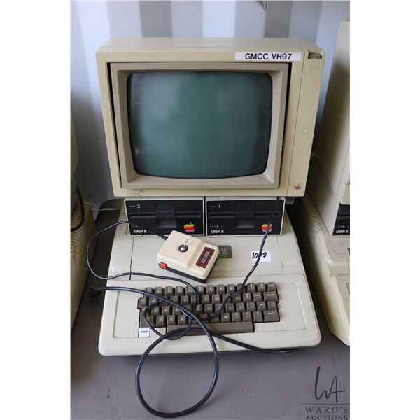 Vintage 1980s Apple II Plus with two Apple Disk II disk drives, Apple Monitor II, and Vintage ANKO j