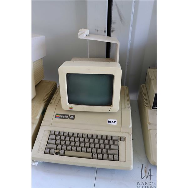 Vintage 1980s Apple IIE and Apple Monitor with stand. See photos for internals , untested at time of