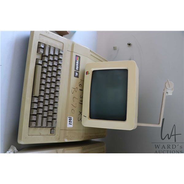 Vintage 1980s Apple IIE and Apple Monitor with stand. See photos for internals , untested at time of