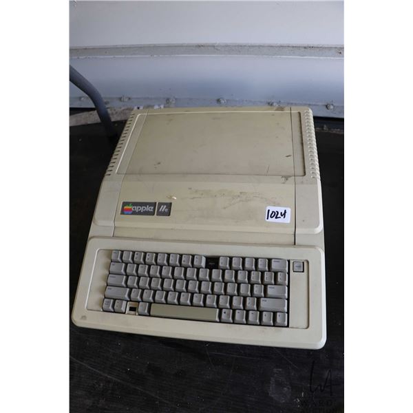 Vintage 1980s Apple IIE. See photos for internals , untested at time of cataloguing