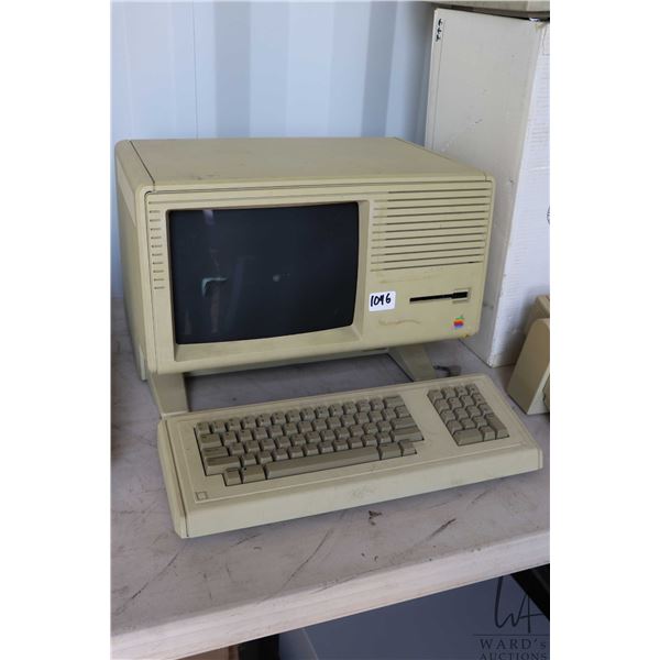 Vintage 1980s Apple Lisa 2 computer with keyboard. Tear in screen fabric. See photos for internals ,