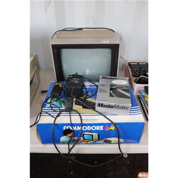 Vintage Commodore 64 with power supply & original box. Commodore Video Monitor model 1702 (case dama