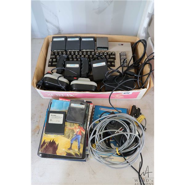 Vintage Commodore 64 with power supply, two joysticks, games including Pac-Man, Sea Wolf, Lemans, Ra