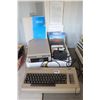 Image 1 : Vintage Commodore 64 with power supply, Commodore 154I external Disk Drive, guide books, Zork II. Un