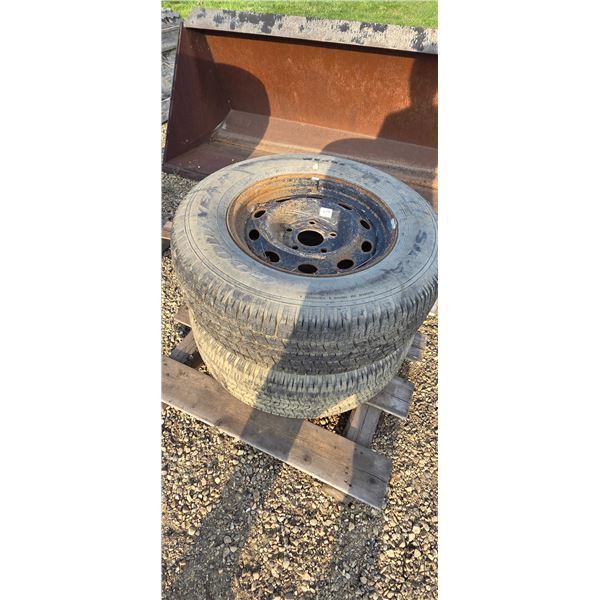 2 GoodYear Wrangler SR-A tires size - P265/65R17 on unidentified Chrysler rims