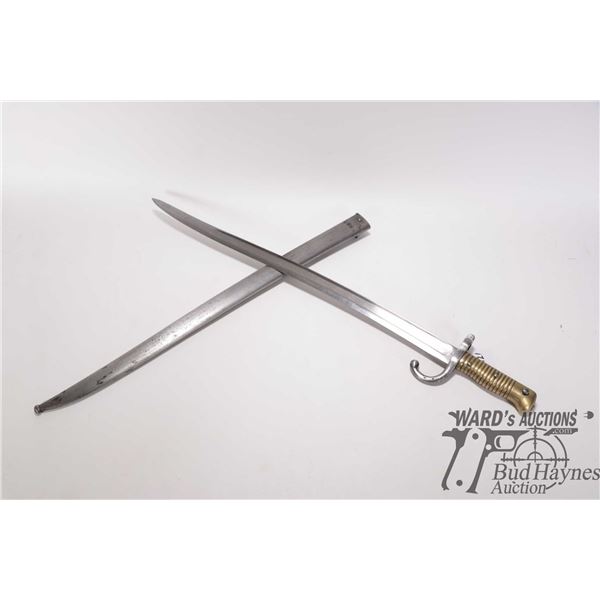 French model 1866 Chassepot bayonet w/ matching numbers scabbard. Brass handle, 22 3/4" carved blade