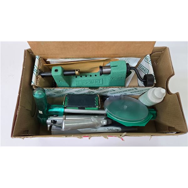 Reloading tools including RCBS prime tool, bullet remover, brushes, plus a Redding case reamer