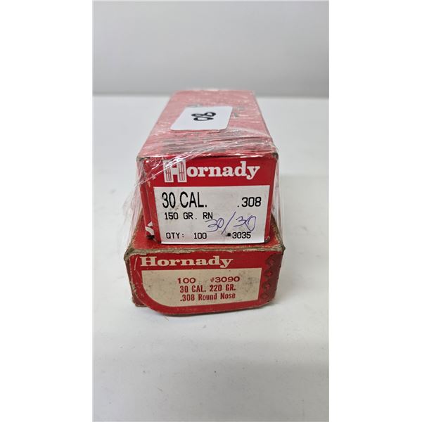 Two boxes Hornady .30 cal including a 56 count box of .220 gr round nose and a 150 gr round nose