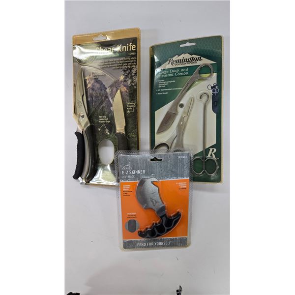 Selection of new in package knives including Outdoor Edge shear/knife combo, Gerber E-Z Skinner and 