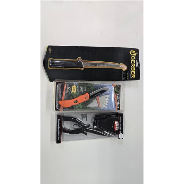 Selection of fishing tools including Gerber Gator fillet knife w/ sheath, Rapala 8 1/2" pliers and a