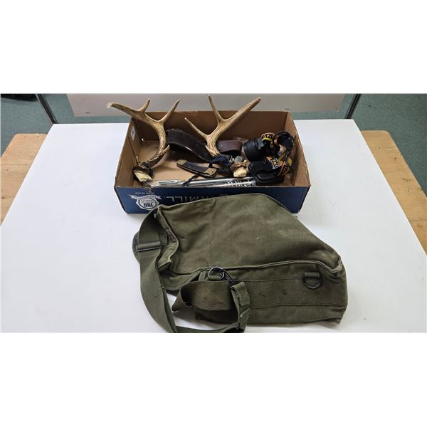 Selection of hunting items including gun sling, cleaning kits, pocket knife, head lamp, etc