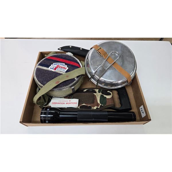 Selection of camping items including pan kit, water bottle, camp saw, mag light and filet knife