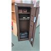Image 2 : Eight gun cabinet w/ one shelf and a large hand gun case. Measures 55" H x 1" W 10" D
