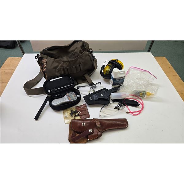 Selection of shooting supplies including trigger pull gauge, ear protection, 1 leather and 1 webbed 