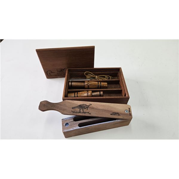 Ducks Unlimited 50th anniversary duck calls in presentation box, and a lomman model 870 turkey call