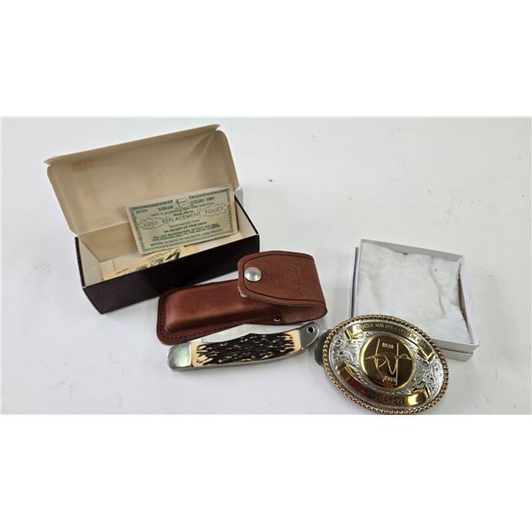 Ducks Unlimited Rodeo style belt buckle 1938-1993 Anniversary, and a Schrade Unlce Henry model 227 U
