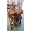 Image 4 : Quality western leather saddle by maker Matt Eberle of Highriver Alberta with floral design and high