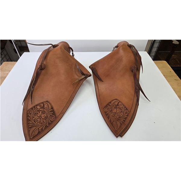 Pair of leather covered show tapderos, tooled to match lot 188 by Matt Eberle