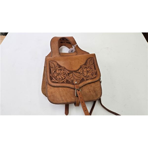 Leather saddle bags with quality tooling by Matt Eberle, made to match lot 188